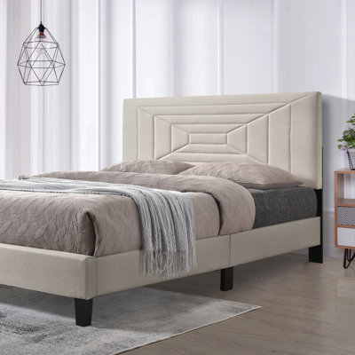 Lit plateforme tapissier touffeté