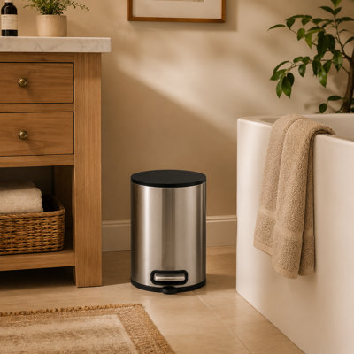 Rust-resistant stainless steel 1.32-gallon round bin with hands-free foot pedal; a compact, convenient, and stylish waste bin for home or office use.