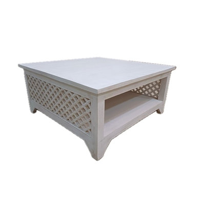 Table basse en bois sculpté