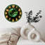 Horloge avec gemme verte et bulles