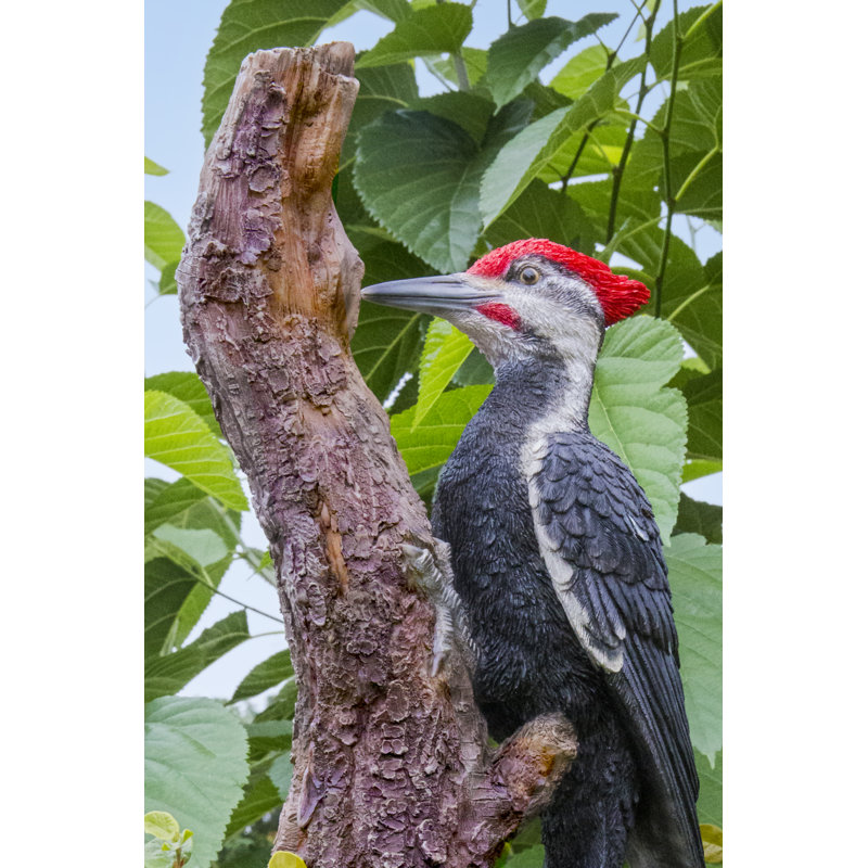 Pileated Woodpecker on A Tree Trunk Garden Statue