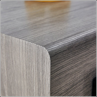 Une table basse en panneau de fibres à densité moyenne. Équipé de tiroirs en bois massif