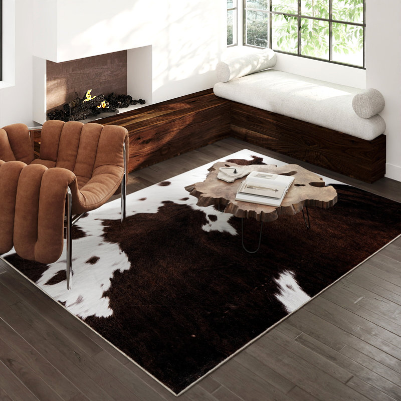 Dark brown cowhide-textured modern non-slip indoor area rug, machine washable and foldable, suitable for living rooms, hotels, apartments, and dormitories.