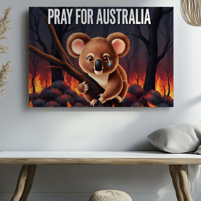 Toile, un koala délavé s'agrippant à une branche d'arbre carbonisée, ses grands yeux expressifs scintillants avec une toile murale solitaire