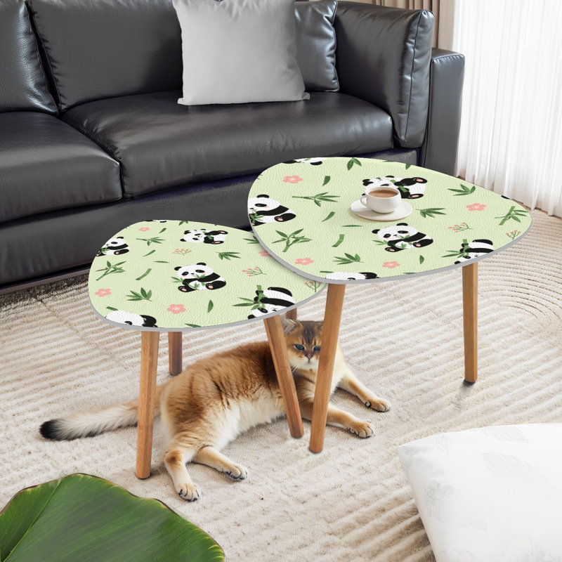 Ensemble de 2 tables basses gigognes triangulaires sans soudure avec des branches de bambou et des plantes