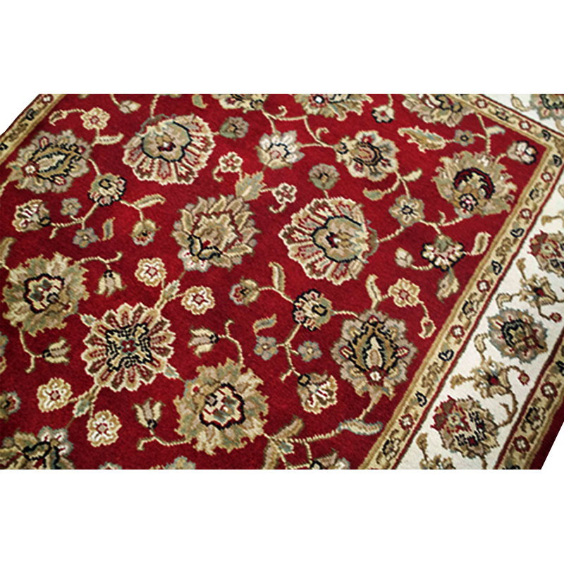 Tapis rouge et ivoire noué à la main de haute qualité