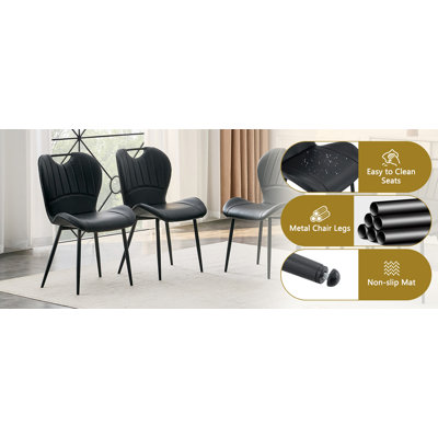 Ensemble de 4 chaises de salle à manger en polyuréthane blanc avec poignée intégrée. Cadre en métal noir, pieds réglables. Chaises de salle à manger à domicile avec coussin confortable extra-large, polyvalent pour de multiples cas de figure.