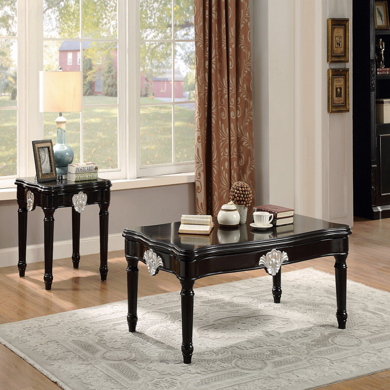 Table basse noire avec pieds tournés
