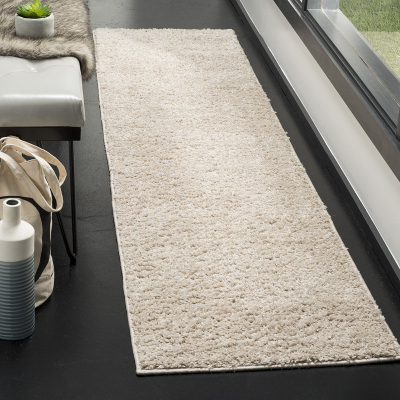 Helsel Shag Performance Machine Washable Solid Color Rug, Round 6'7"
