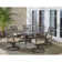 Ricard Round 6 - Person 60'' Long Aluminum Dining Set with Cushions