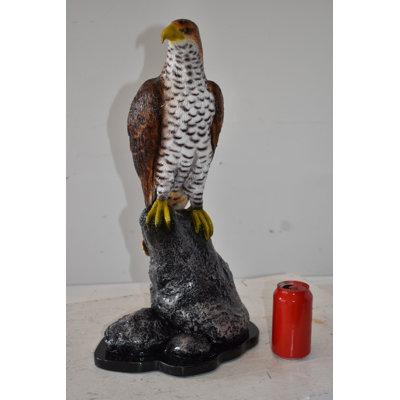 Meggan Eagle Standing on a Rock Looking for Prey Size: 10" x 13" x 22"H