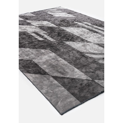 Tapis moderne à tirets abstraits