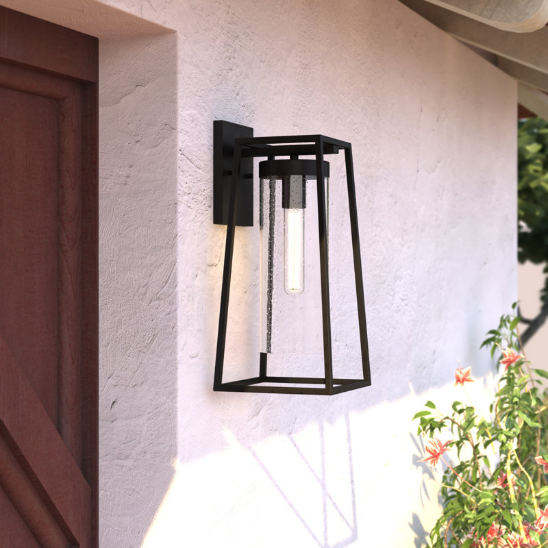 Adéla 15.75 in. H 1-Light Textured Black Dusk to Dawn Sensor Outdoor Wall Sconce, Durable Steel, Clear Seeded Glass Shade, LED Compatible for Exterior Porch Patio Front Door or Garage