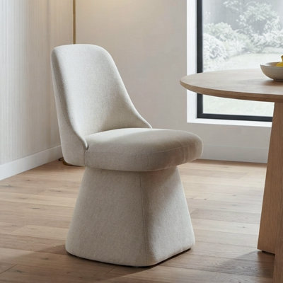 Chaise pivotante rembourrée en tissu
