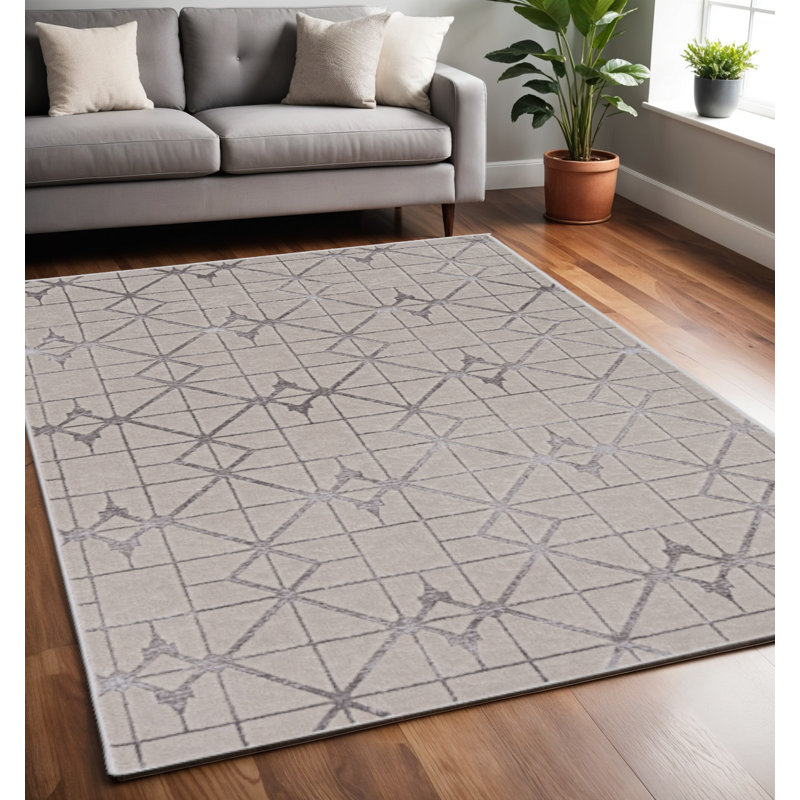 Tapis géométrique ivoire et argenté 5 pi x 8 pi