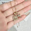 Accessoire de collier croix carrée dorée