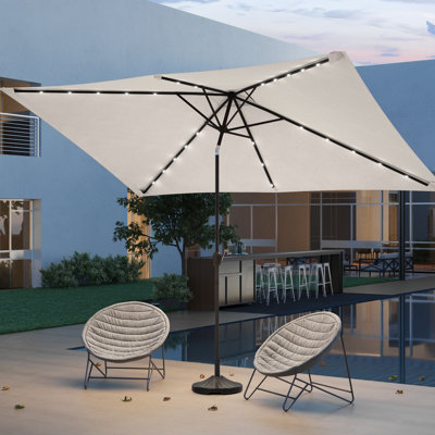 Upgrade Your Outdoor Space: 10×6.5FT LED Rectangular Patio Umbrella with UV Protection, Easy Tilt, and Wind-Resistant Features