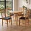 Bowerbank Extendable Round Solid Wood Dining Table