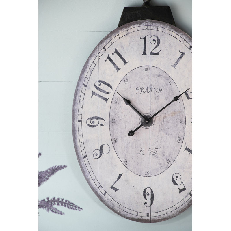 Horloge murale ovale