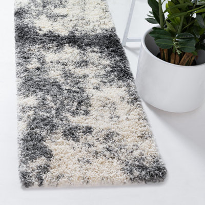 Tapis abstrait en polypropylène tissé à la machine en ivoire / gris