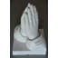Sculpture en marbre priant mains