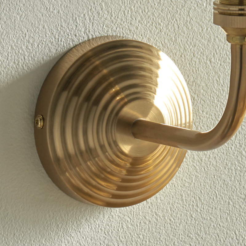 Obelisk Arc Wall Fitting finished in Br Aged Brass