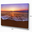 Eaux de mer teintées oranges au coucher de soleil, reproduction de photo sur toile tendue-18267467-33288063