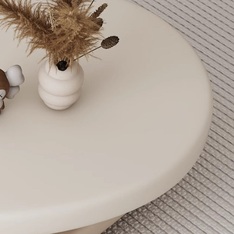 Orren Ellis Tamirra Cream Coffee Table
