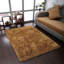 Tapis à poils longs en polyester touffeté à la main Birkett-24364031
