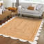 Tapis uni en jute tressé festonné-974502844
