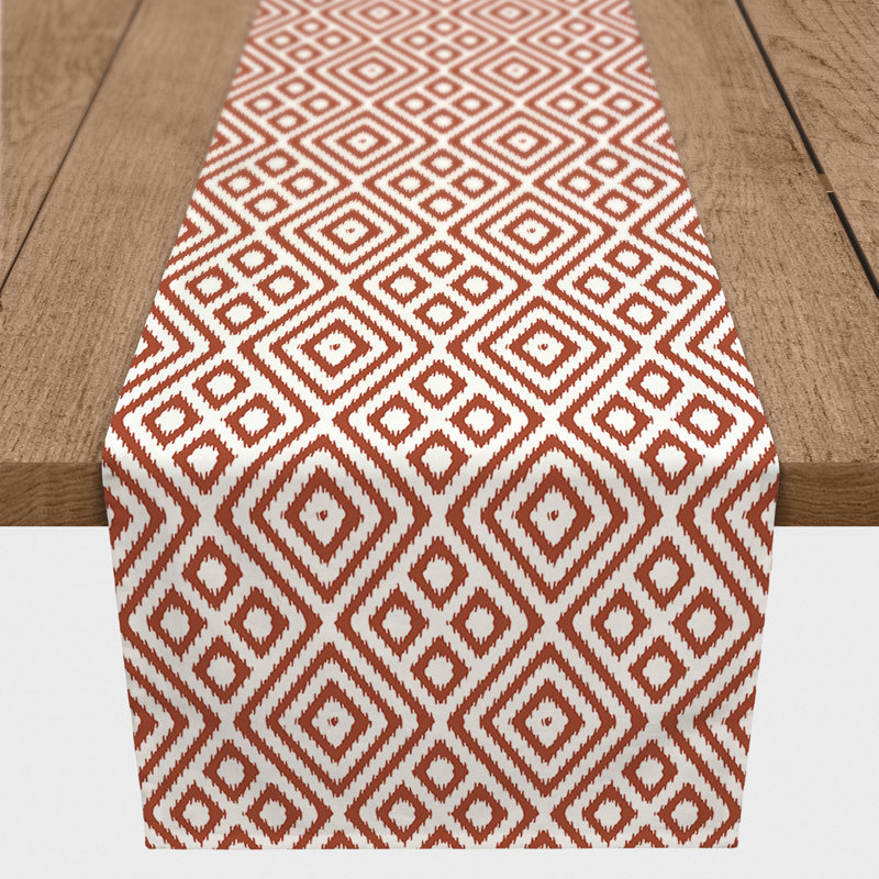 Chemin de table en losanges pointillé Nalston, 72 po x 16 po, Rouille, Ikat
