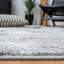 Tapis gris / noir en polypropylène tissé à la machine à motif abstrait Leonaldo-114978021