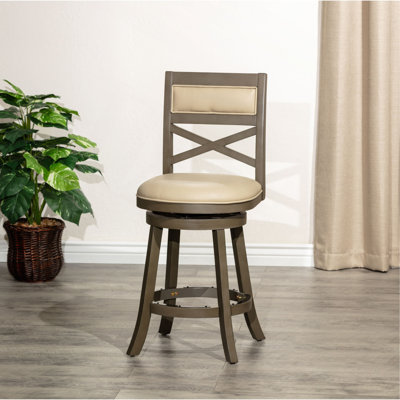 Tabouret pivotant à dossier en X classique avec siège rembourré et pieds évasés, conçu pour durer et procurer du confort