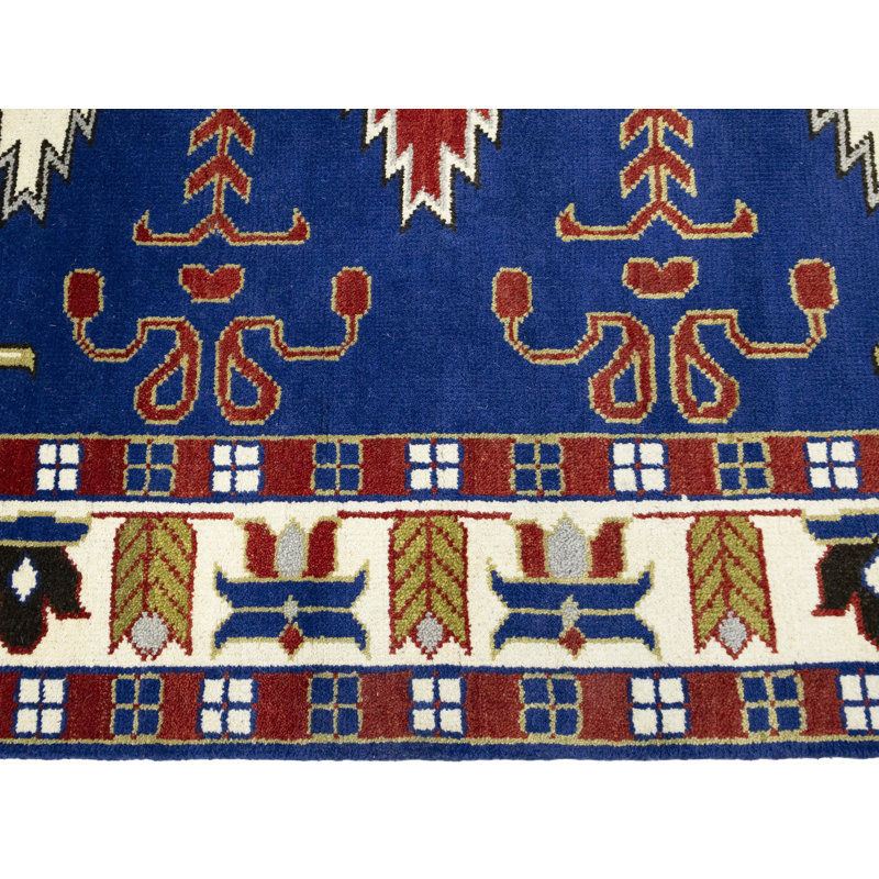 Tapis géométrique bleu fait à la main 6 x 9 Kazak