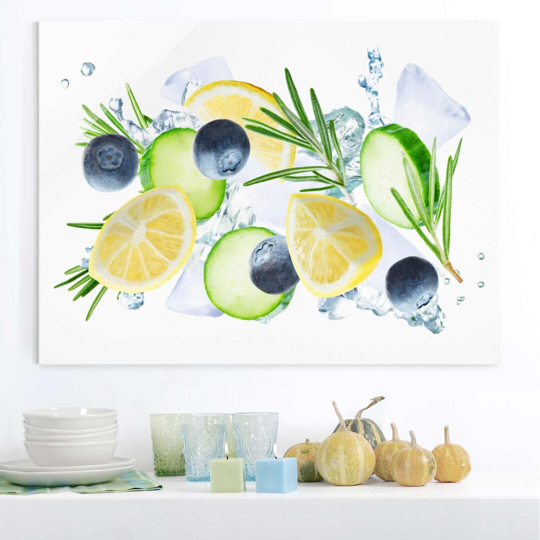 Glasbild Blaubeeren und Zitrone auf Eis