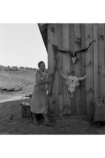 " Poverty With Rife And Cattle Skulls " by Dorothea Lange, 30" H x 20" W
