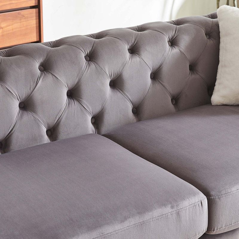 Canapé Chesterfield de luxe avec velours capitonné et pieds en métal