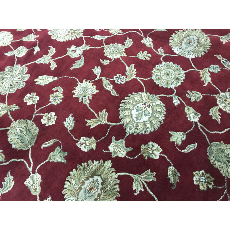 Tapis rouge et ivoire noué à la main de haute qualité