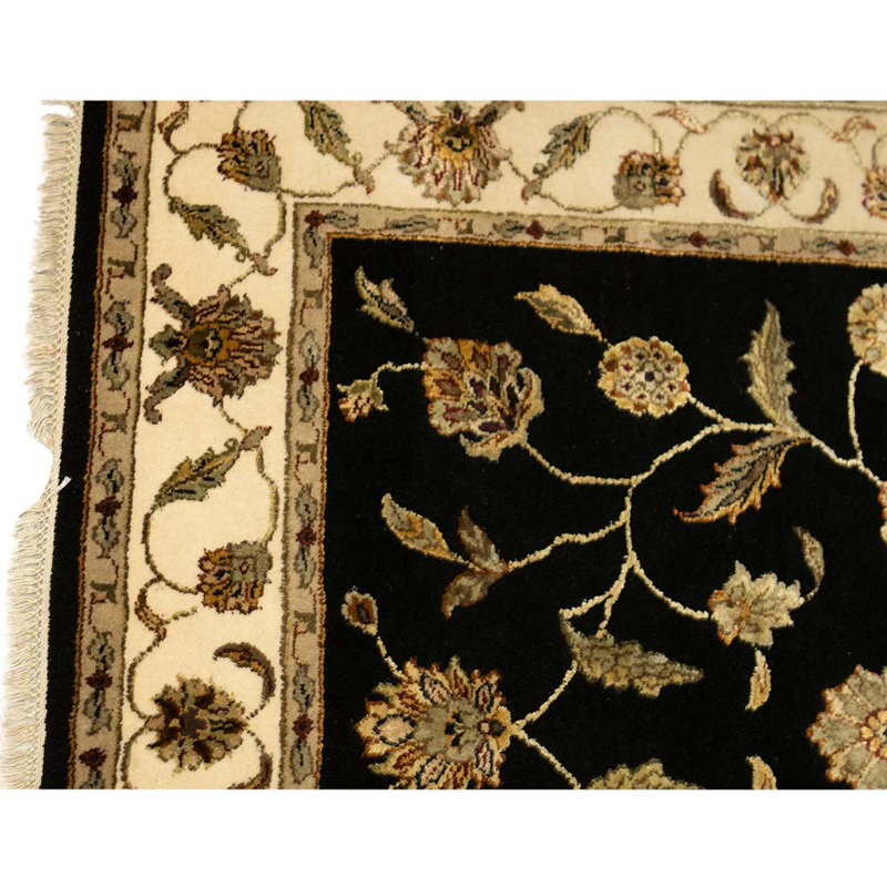 Tapis noir / ivoire de haute qualité noué à la main
