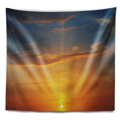 Tapisserie du soleil de beach au-dessus de l’horizon