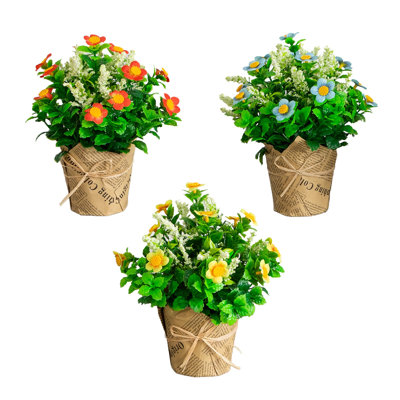 8in. Artificial Daisy Plant in Newspaper Wrapped Planter - Set of 3