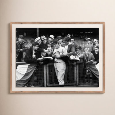 Alphon " Joe DiMaggio Signing Autotgraphs For Fans " by Getty Images