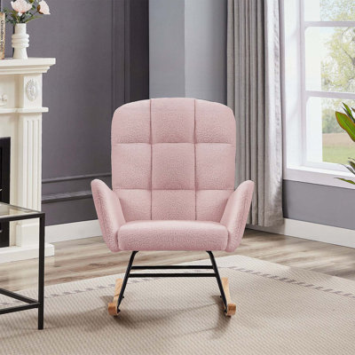 Fauteuil à bascule avec structure en métal et pieds en bois pour un confort et une stabilité ultimes