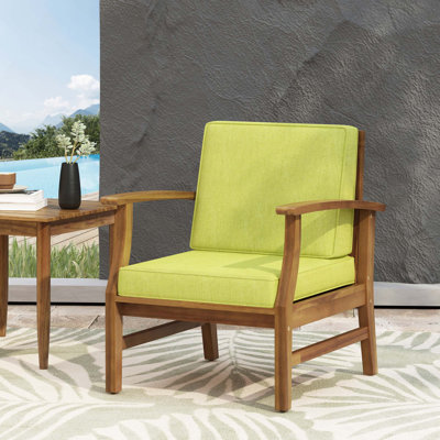 Fauteuil club d'extérieur à lattes avec structure en bois d'acacia et coussin résistant à l'eau