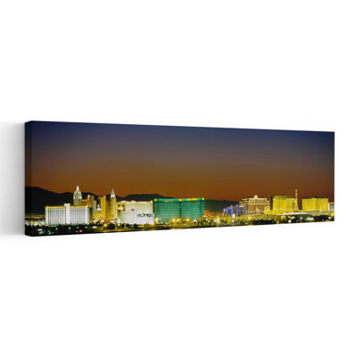 Buildings lit up at dusk Las Vegas Nevada USA 1 Piece Wrapped Canvas Panoramic Wall Art