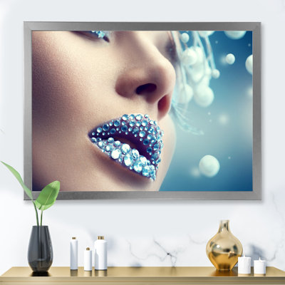" Close-up Of Gems On Woman Lips "