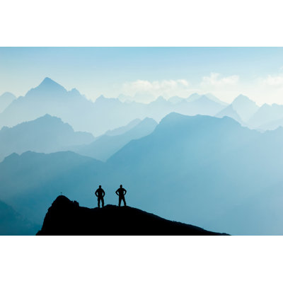 Two Men Reaching Summit After Climbing And Hiking - Wrapped Canvas Print