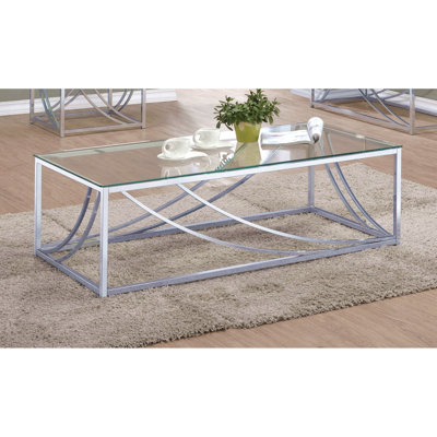 Table basse en verre et chrome avec pieds en métal Brianne