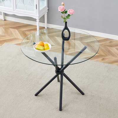 Une table ronde circulaire en verre trempé transparent d'un diamètre de 36,6 pouces
