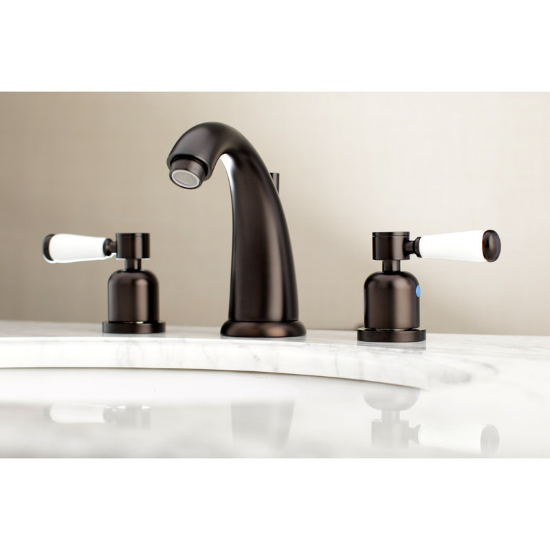 Kingston Brass Paris Two-Handle 3-Hole Deck Mount Widespread Bathroom Faucet with Retail Pop-Up Drain, Oil Rubbed Bronze